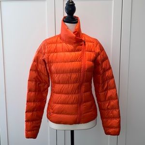 Athleta women’s transitional winter to spring bright orange fitted jacket.